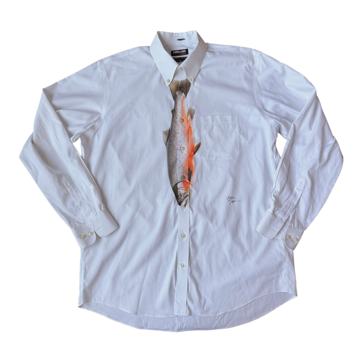 A white long-sleeve button-down shirt with a realistic trout graphic printed down the center front, laid flat on a white background.