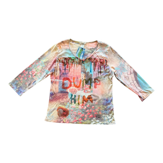 A long-sleeve V-neck top with a colorful, painterly abstract design and the words 'DUMP HIM' printed across the front, displayed flat against a white background.