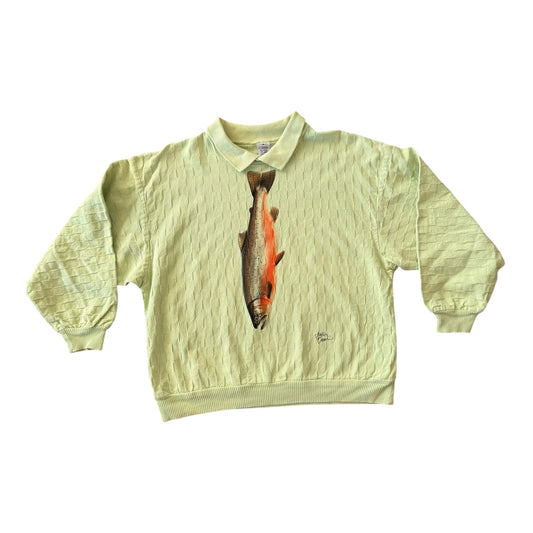 A pale yellow-green long-sleeve crewneck sweatshirt featuring a realistic graphic of a salmon fish printed vertically down the center chest, displayed flat against a white background.