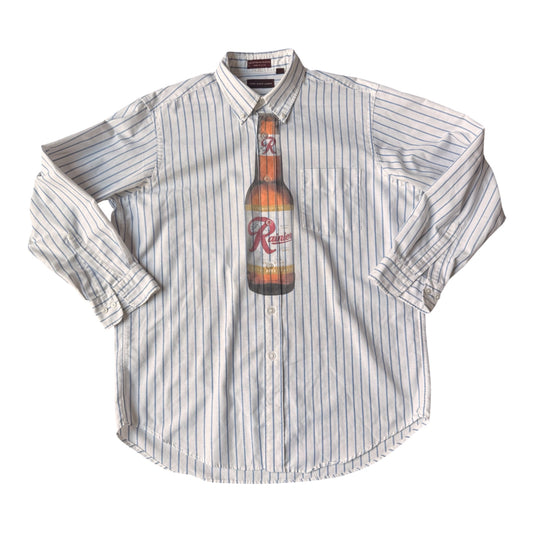 A white long-sleeve button-up shirt with thin blue vertical pinstripes, featuring a graphic print of a Rainier beer bottle on the center chest.