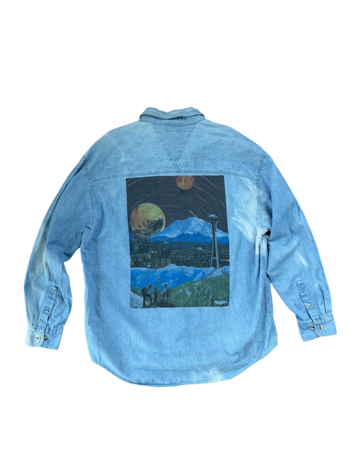 Light blue washed denim button up long sleeve shirt with a surreal Seattle collage printed on the back