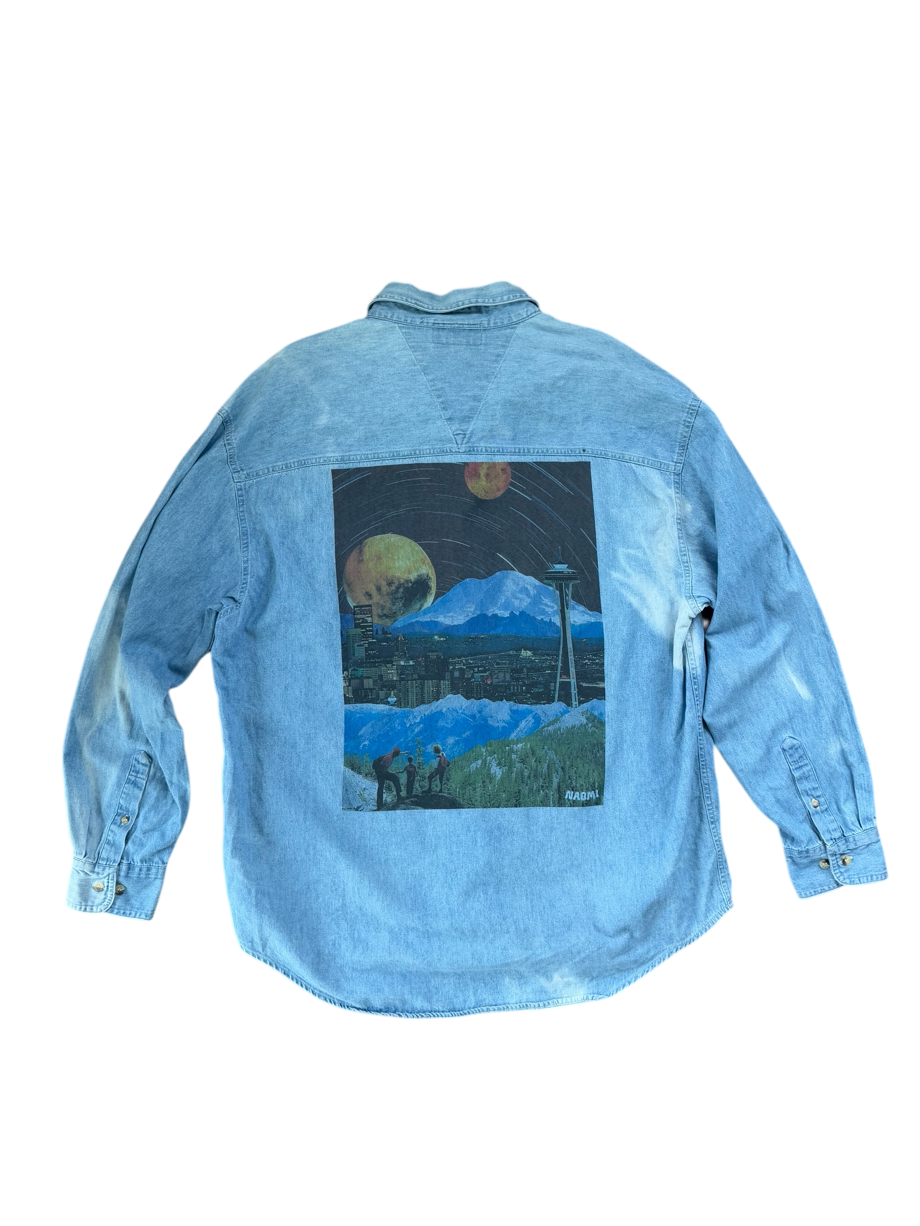 Light blue washed denim button up long sleeve shirt with a surreal Seattle collage printed on the back