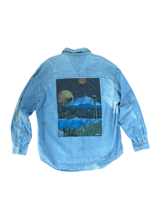 Light blue washed denim button up long sleeve shirt with a surreal Seattle collage printed on the back