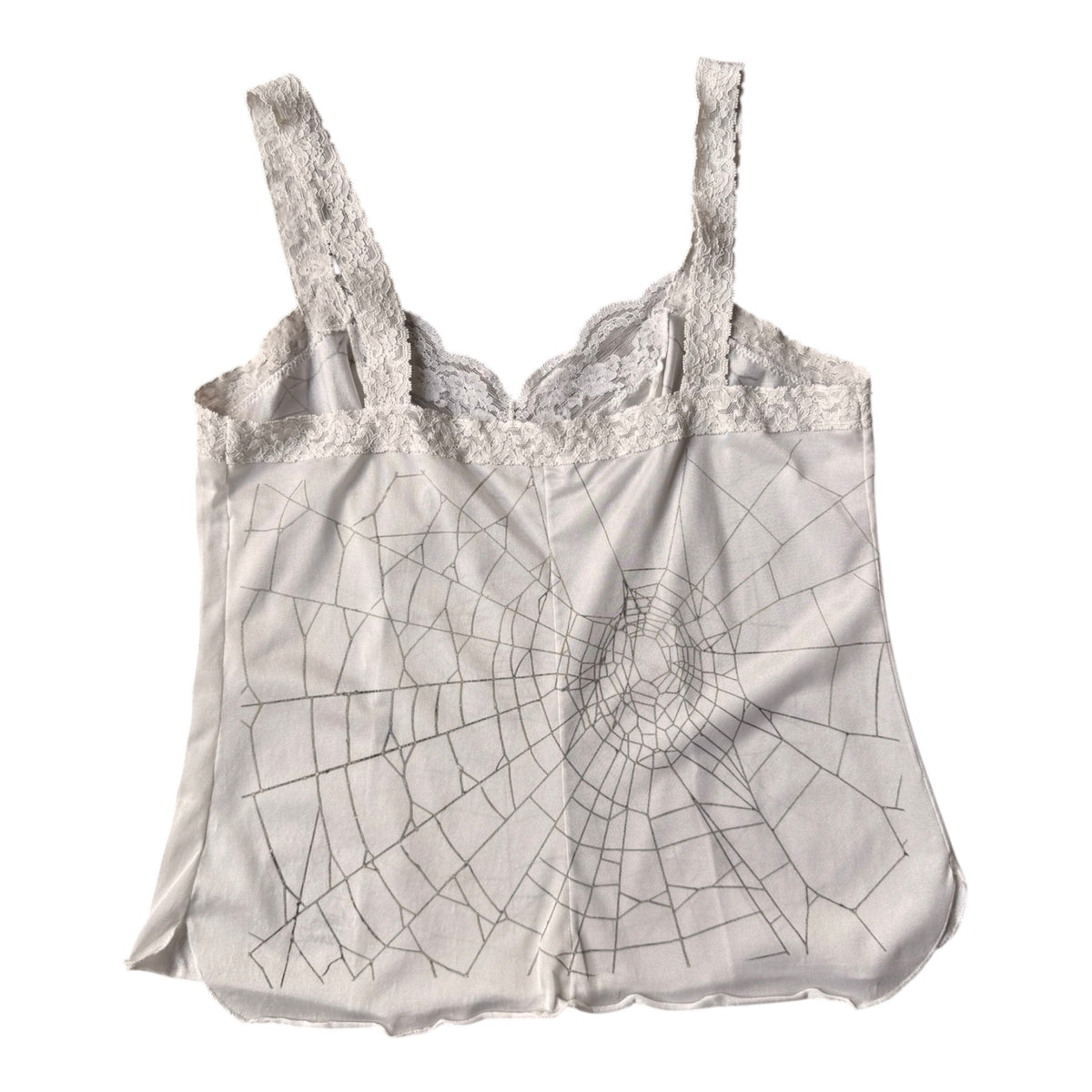 A light gray lace-trimmed camisole top with a spiderweb line pattern printed across the front, shown against a plain white background.